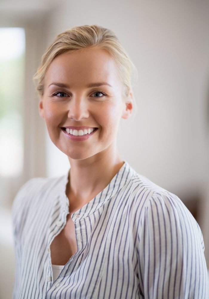 beautiful-woman-smiling-at-home.jpg